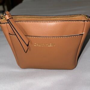 NWOT Calvin Klein camel color tan small bag can put wristlet has pocket in fron